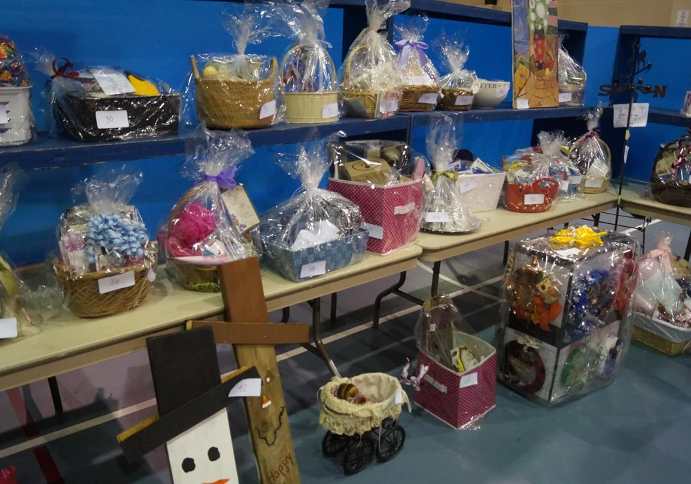 Donated baskets and raffle items displayed for Oktoberfest