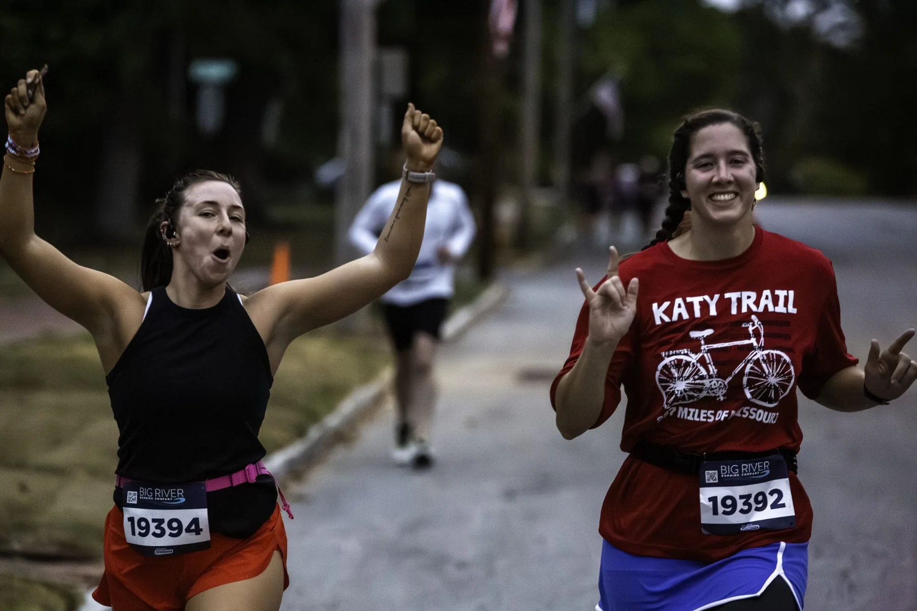 Runners celebrating during the Friday night 5K
