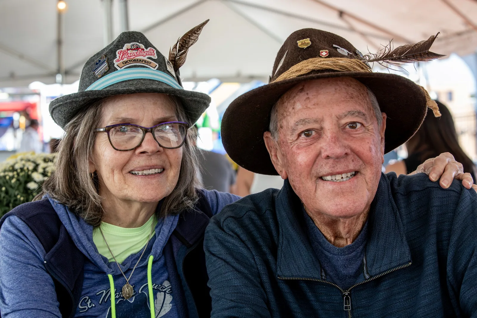 Older couple wearing Oktoberfest hats